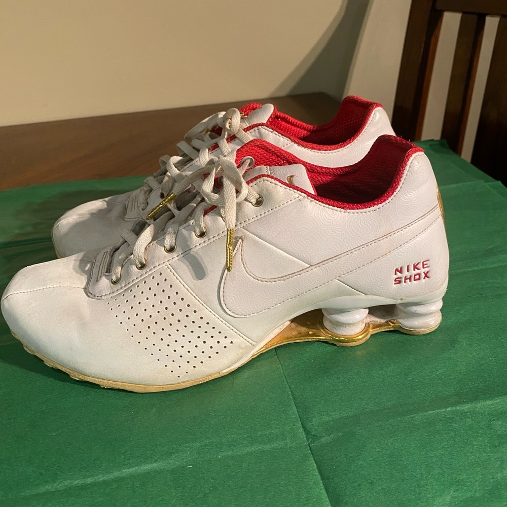 Women’s Nike Shox White,Red and Gold Size 9